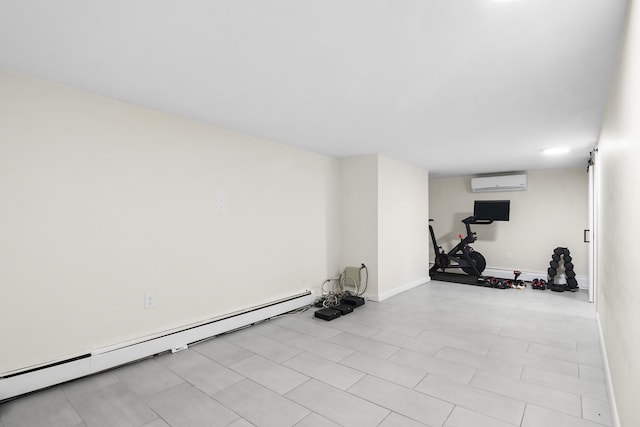 exercise room featuring a baseboard heating unit, baseboards, and a wall mounted air conditioner