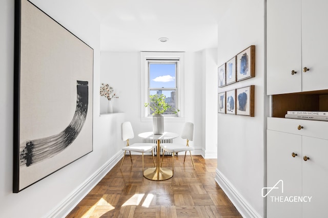 living area with baseboards