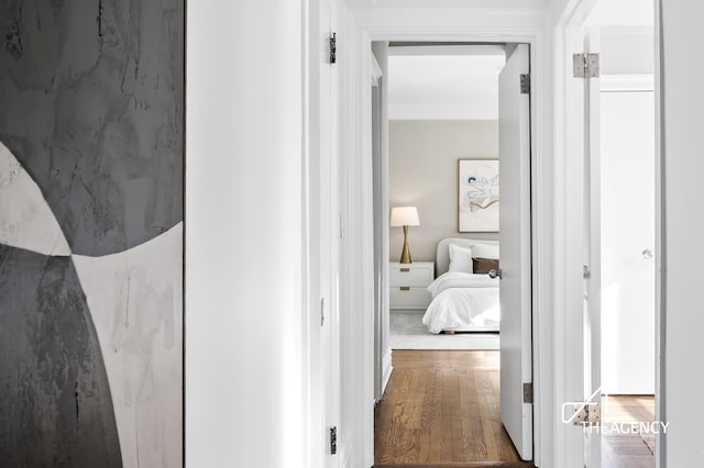 hallway featuring wood finished floors