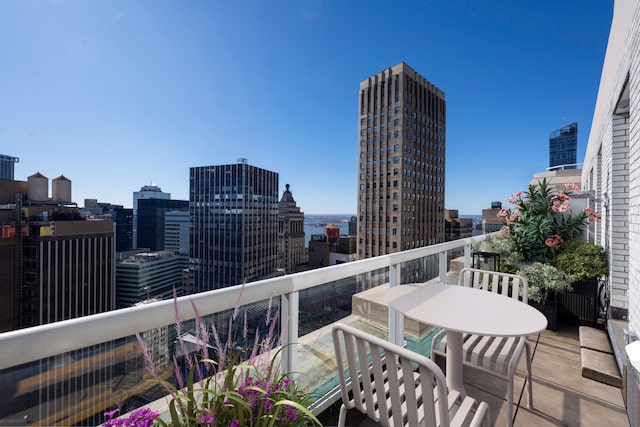 balcony featuring a view of city