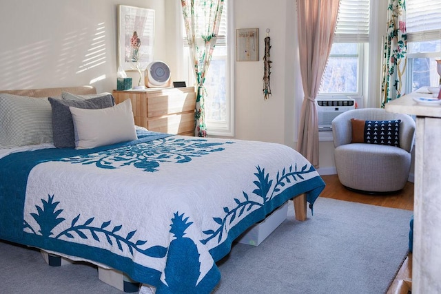 bedroom featuring wood finished floors