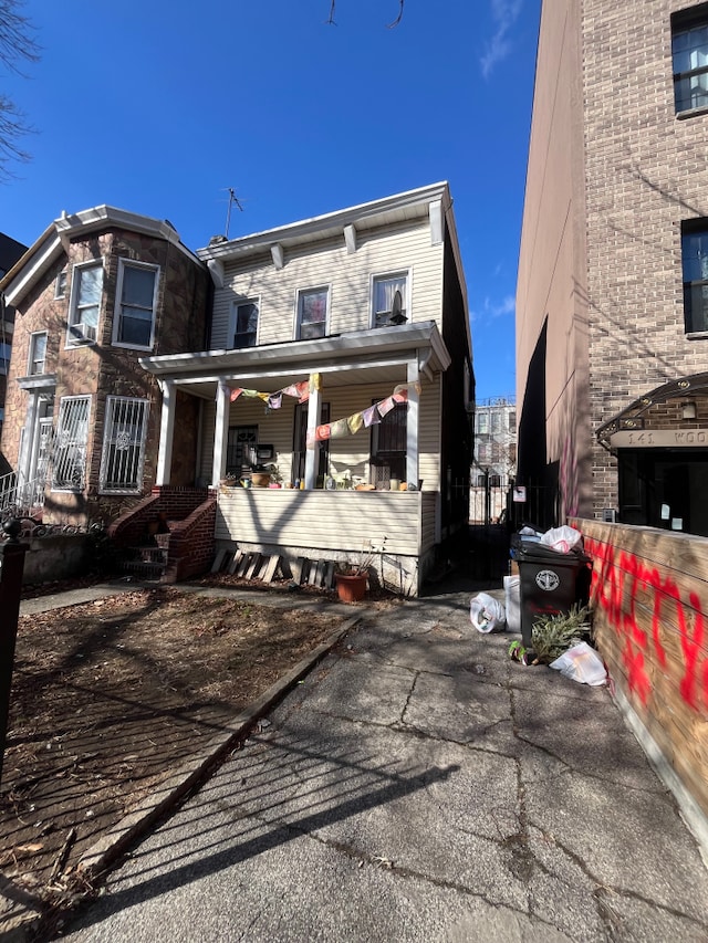 139 Woodbine St, New York City, NY 11221 - view of rear view of house