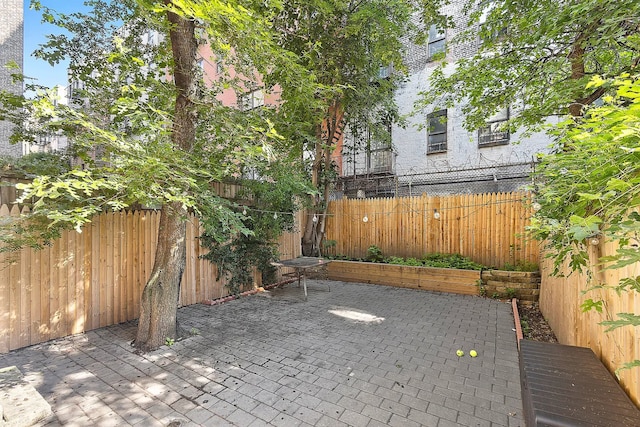 view of patio with fence