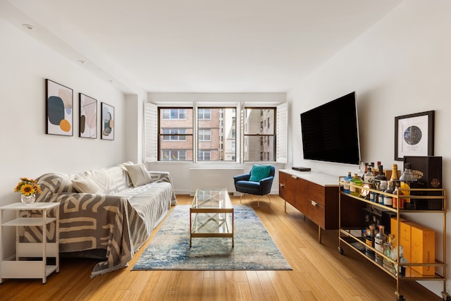 living room featuring light wood-style floors