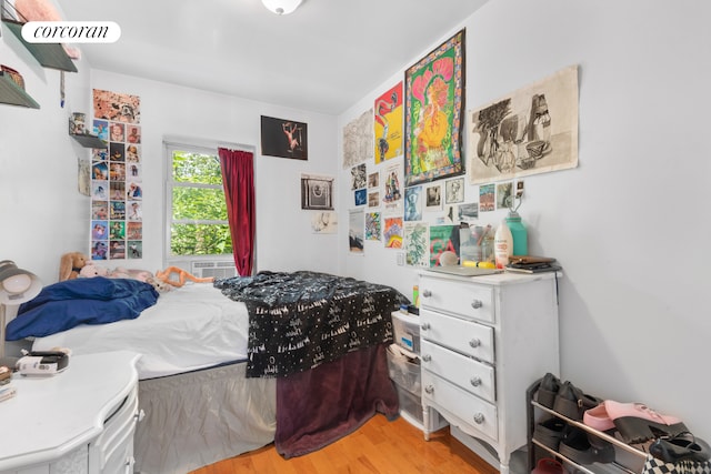 bedroom featuring light wood-style floors