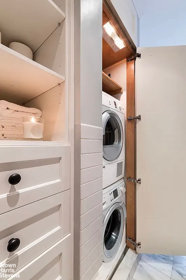 1361 Madison Ave Unit 6G, New York City, NY 10128 - laundry room with stacked washer / drying machine