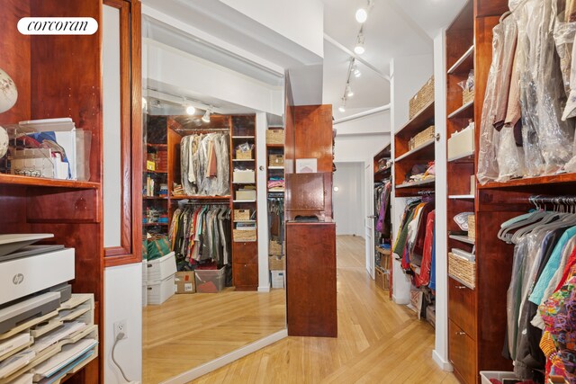 walk in closet featuring light wood-type flooring