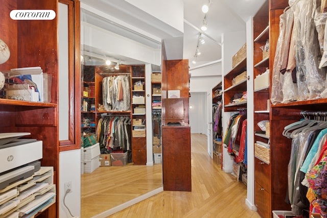 spacious closet with light wood-style flooring