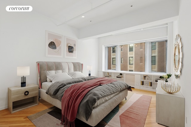 bedroom featuring recessed lighting, visible vents, and light wood-style floors