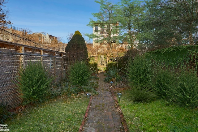 view of yard with fence