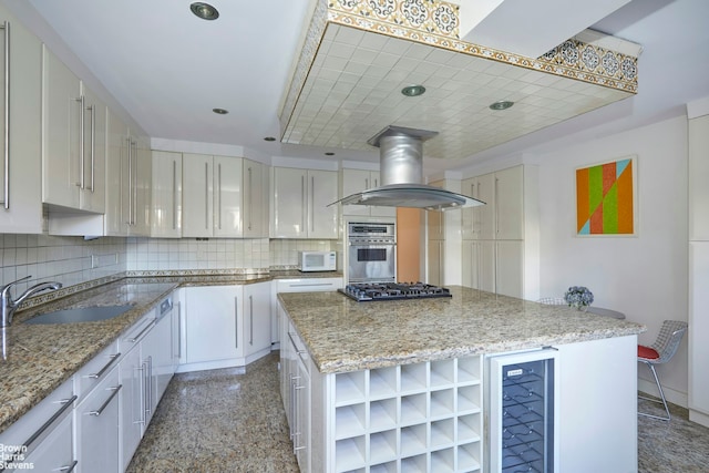 kitchen with decorative backsplash, island exhaust hood, granite finish floor, open shelves, and a sink