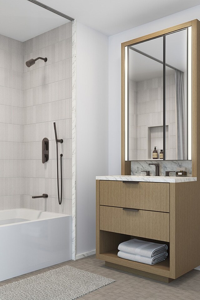 bathroom with vanity and shower / bathtub combination