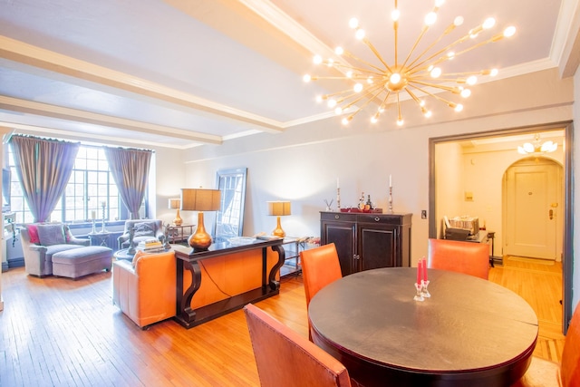 living room with crown molding, light wood-style flooring, a chandelier, and beam ceiling