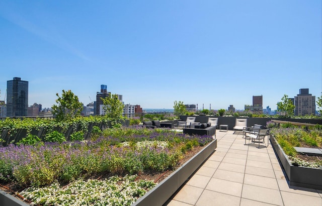200 E 62nd St Unit 23D, New York City, NY 10065 - view of home's community featuring a view of skyline and an outdoor living space