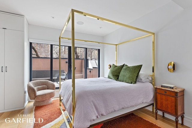 bedroom featuring wood finished floors