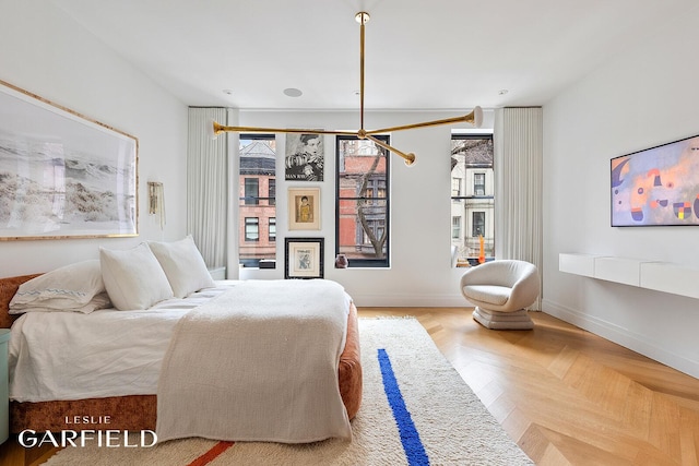 bedroom featuring baseboards