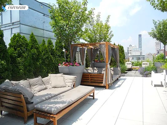 view of patio / terrace featuring a view of city, outdoor lounge area, and a pergola