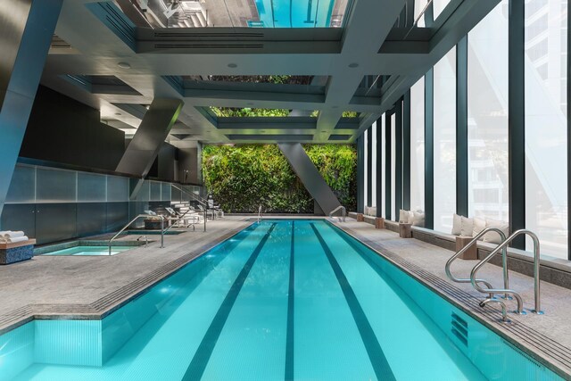 53 W 53rd St Unit 49A, New York City, NY 10019 - pool featuring an indoor in ground hot tub and a patio area