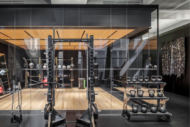 53 W 53rd St Unit 49A, New York City, NY 10019 - gym featuring wood finished floors