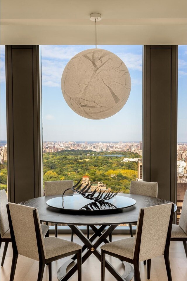 53 W 53rd St Unit 49A, New York City, NY 10019 - dining area featuring plenty of natural light