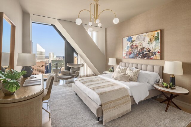 53 W 53rd St Unit 49A, New York City, NY 10019 - bedroom featuring a view of city and an inviting chandelier
