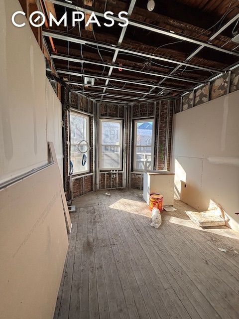 miscellaneous room featuring hardwood / wood-style floors