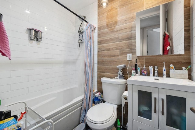 118 Kingsland Ave Unit 1, New York City, NY 11222 - full bath featuring vanity, shower / bath combo with shower curtain, toilet, and tile walls