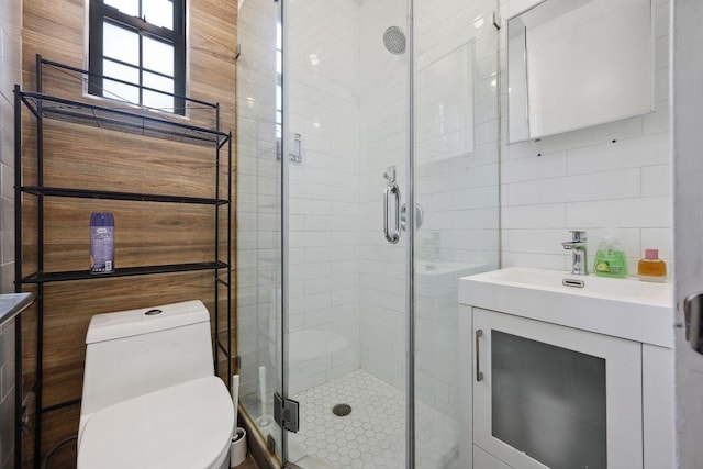118 Kingsland Ave Unit 1, New York City, NY 11222 - full bathroom with tile walls, vanity, a shower stall, and toilet