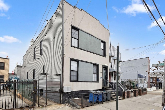118 Kingsland Ave Unit 1, New York City, NY 11222 - view of front of house featuring a gate