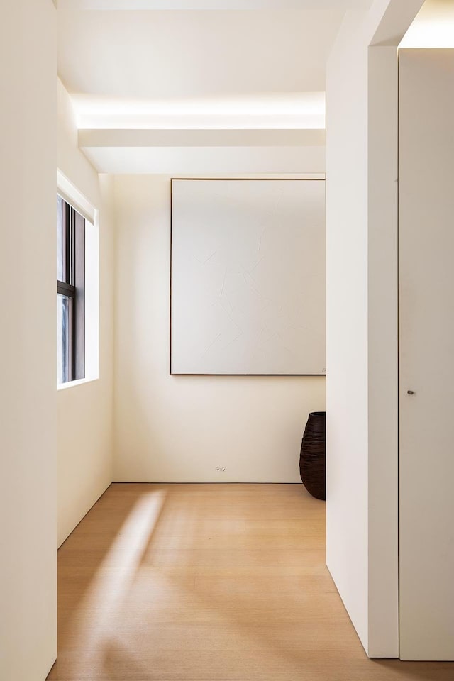 empty room with wood finished floors