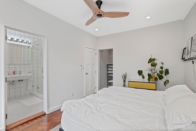 bedroom with recessed lighting, connected bathroom, baseboards, and ceiling fan