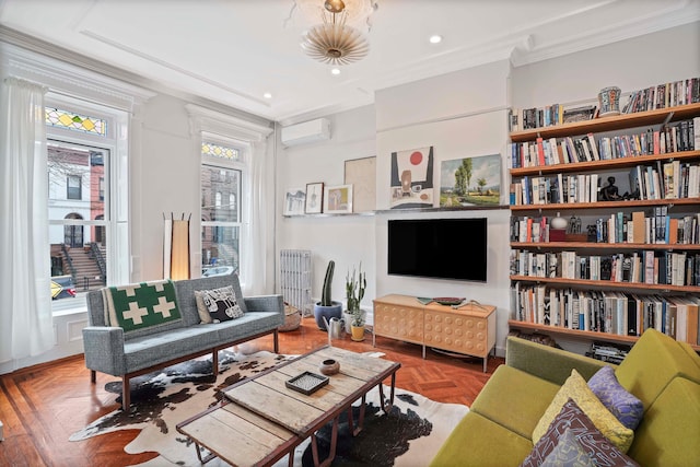 living area featuring ornamental molding, recessed lighting, and a wall mounted air conditioner