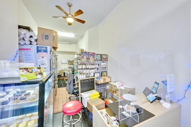 tiled office with ornamental molding, wine cooler, and ceiling fan