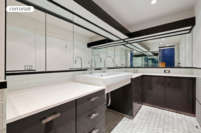 145 Nassau St Unit 8A, New York City, NY 10038 - full bath featuring vanity, backsplash, and recessed lighting