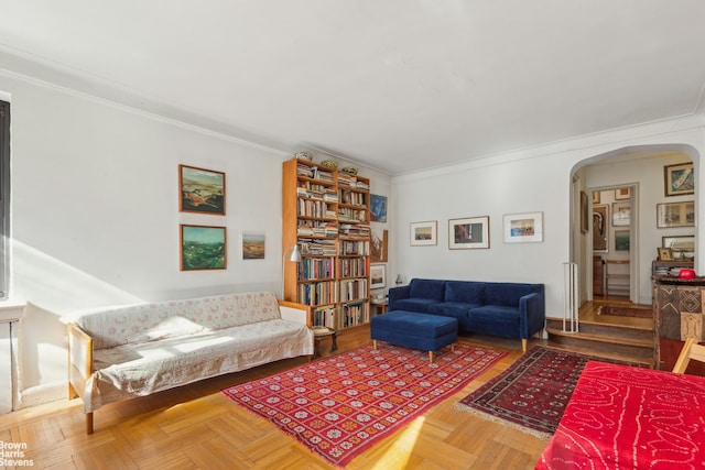 420 E 86th St Unit 4H, New York City, NY 10028 - living room featuring arched walkways and ornamental molding