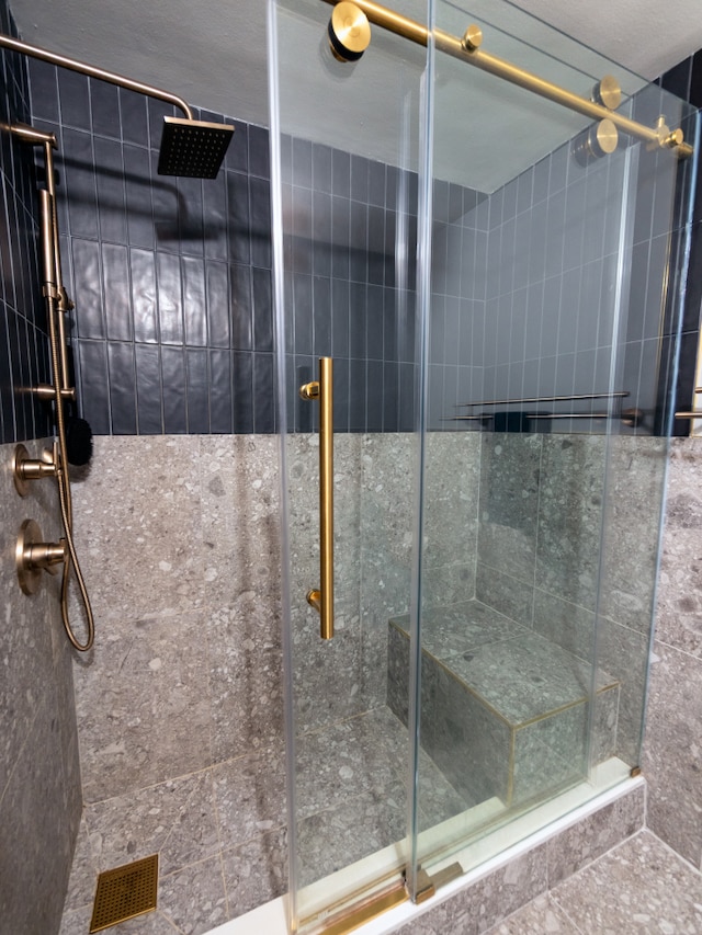 bathroom featuring a stall shower