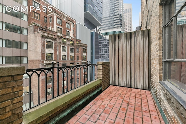 balcony featuring a city view