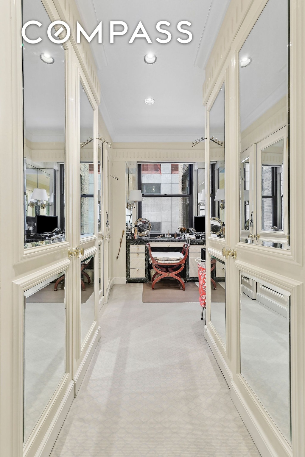 bathroom featuring crown molding, recessed lighting, and french doors