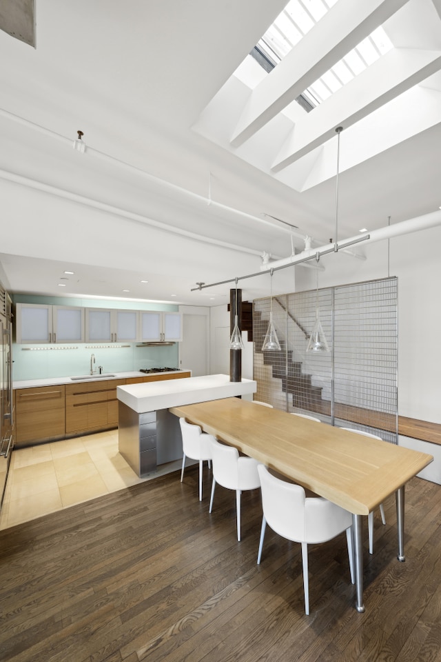 dining area featuring light wood-style floors