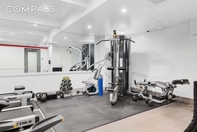 workout area with recessed lighting