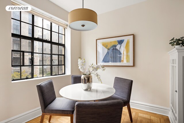 dining space with baseboards