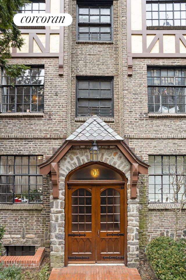 116 Pinehurst Ave Unit M43, New York City, NY 10033 - doorway to property featuring brick siding