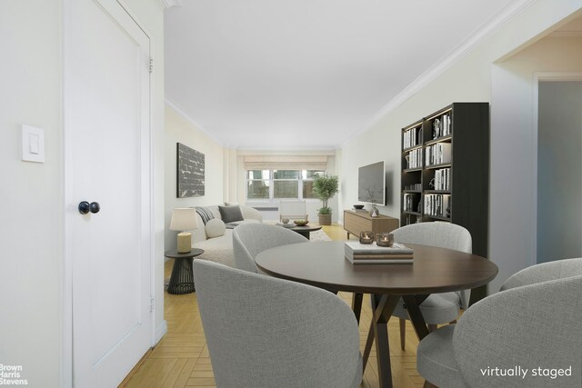 166 E 35th St Unit 10G, New York City, NY 10016 - dining room featuring crown molding