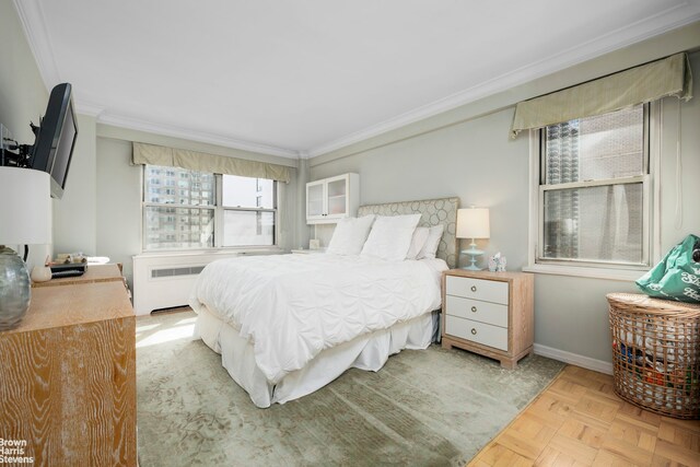 166 E 35th St Unit 10G, New York City, NY 10016 - bedroom with radiator and ornamental molding