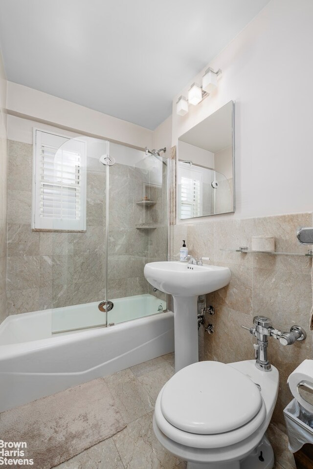 166 E 35th St Unit 10G, New York City, NY 10016 - full bath with shower / bath combination and tile walls