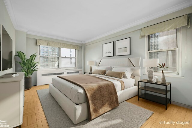 166 E 35th St Unit 10G, New York City, NY 10016 - bedroom with radiator and ornamental molding