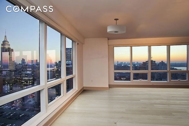 sunroom / solarium with a view of city