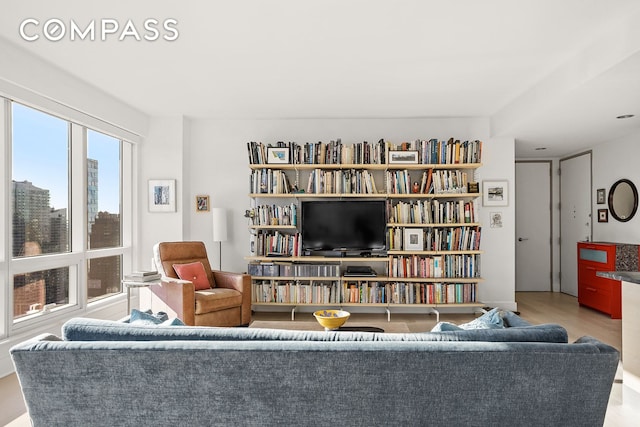 sitting room featuring wood finished floors