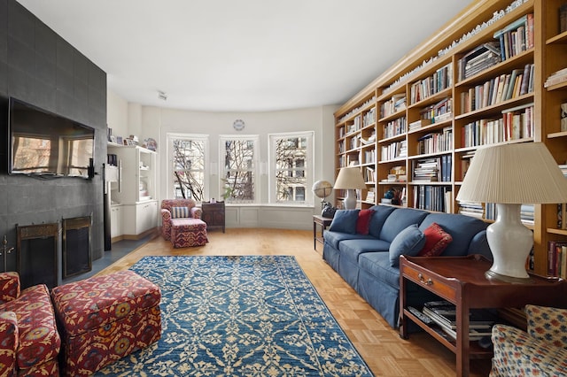 sitting room with a large fireplace