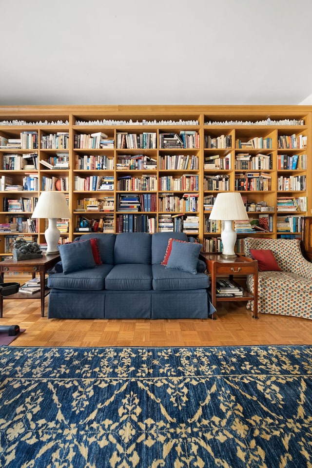 living area with wall of books